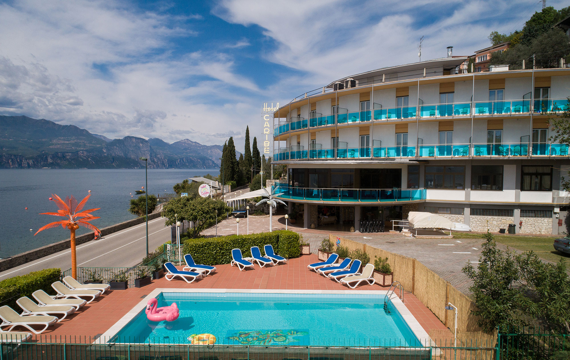 The pool at Hotel Caribe, Lake Garda just past the railing