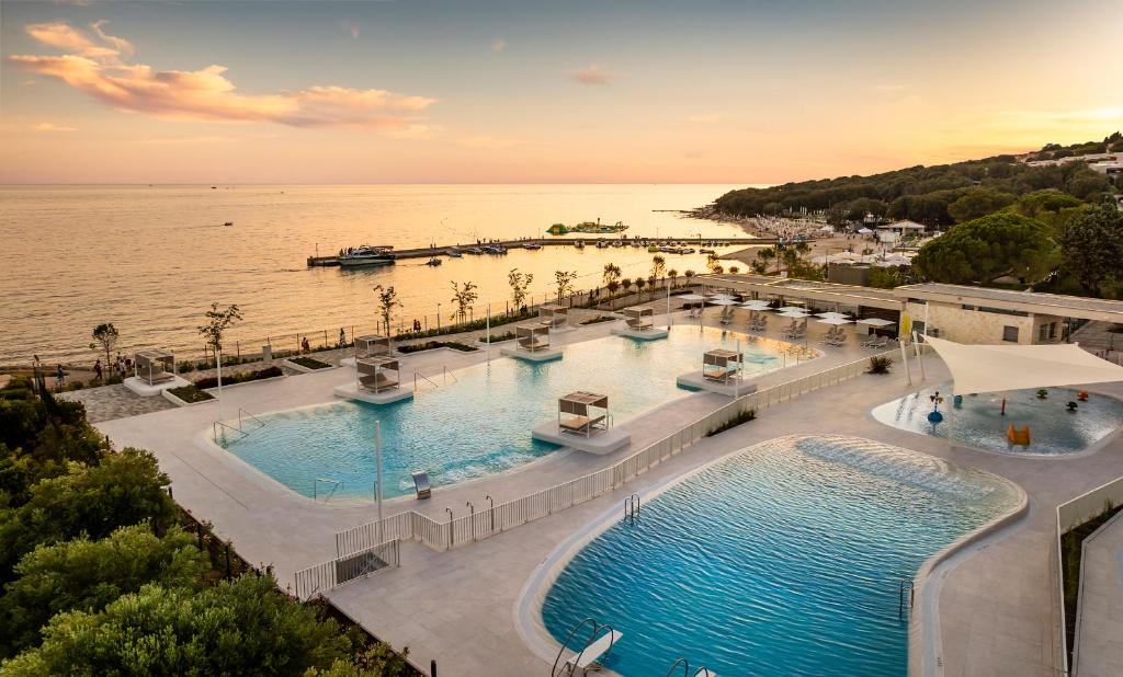 Amarin pools at sunset, the Adriatic just beyond